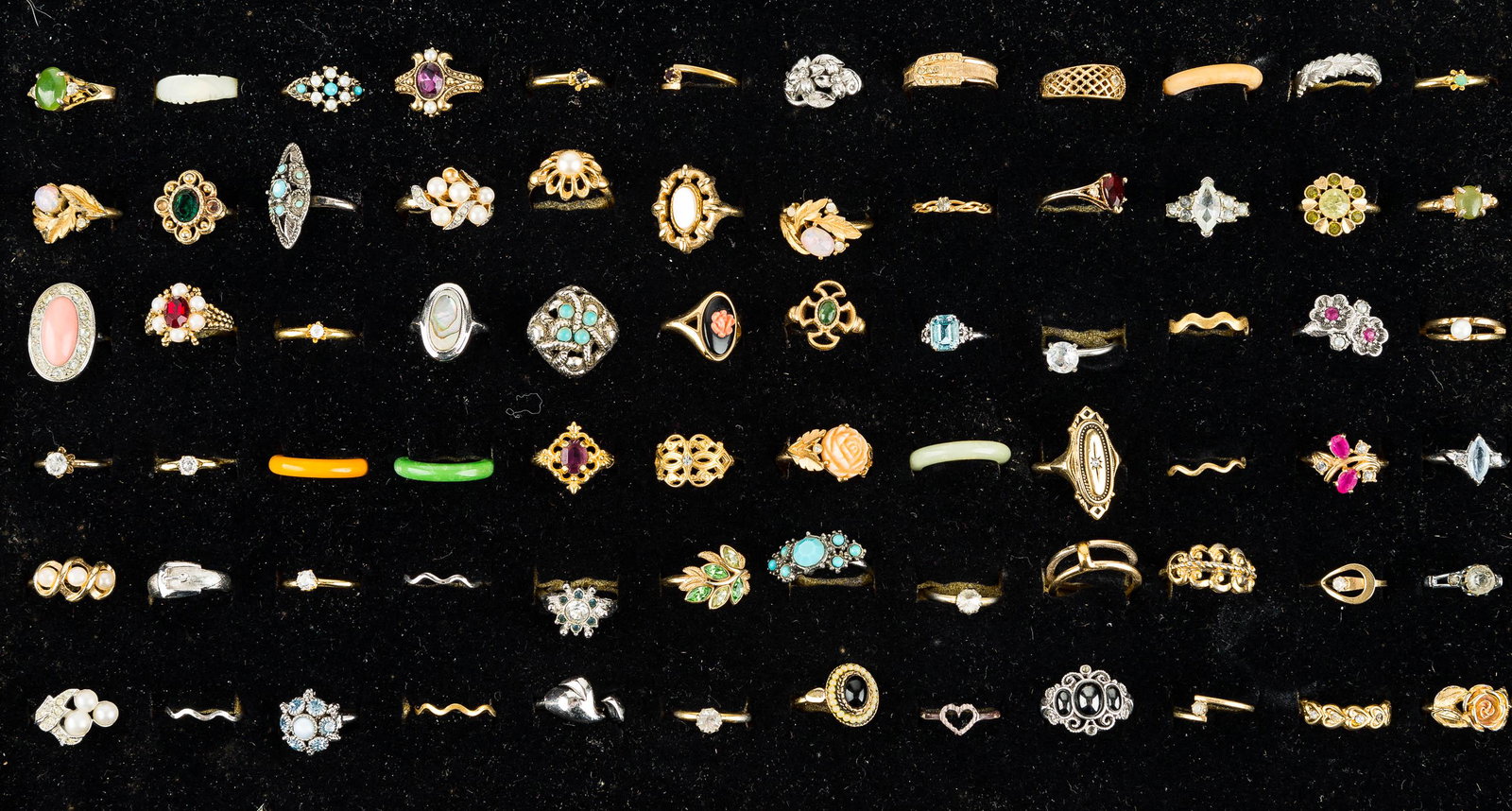 Decorative Ring Collection: This large collection includes rings with rhinestones, faux pearls, abalone, and others. There are (72) total rings.