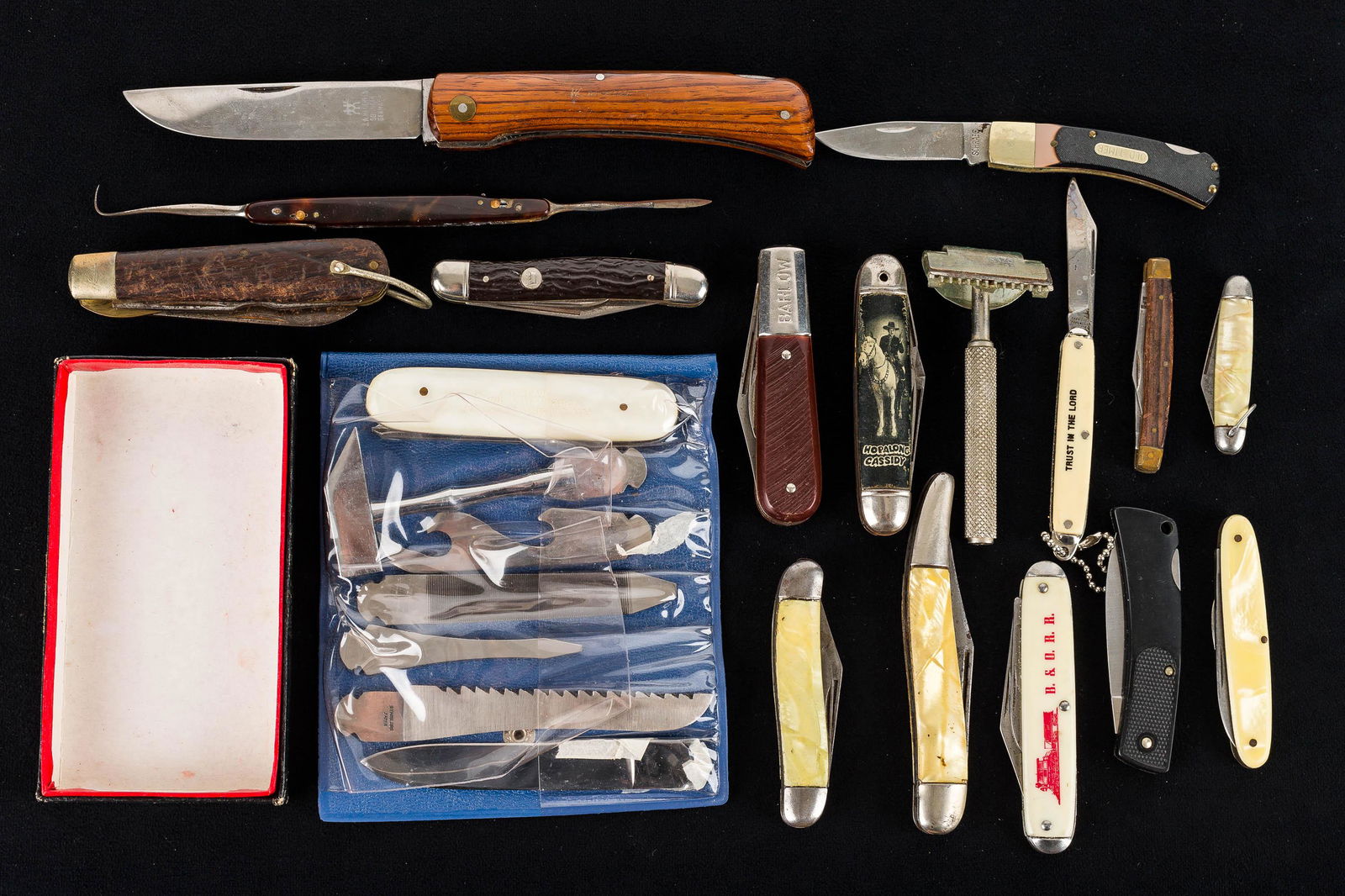 Folding & Other Knives: There are (15) knives, including Barlow, Old Timer, Schrade, B&O Railroad advertising pocketknife marked "USA", a Henckels folding knife with exotic wood handle marked "W. Mueller" on handle, other kn