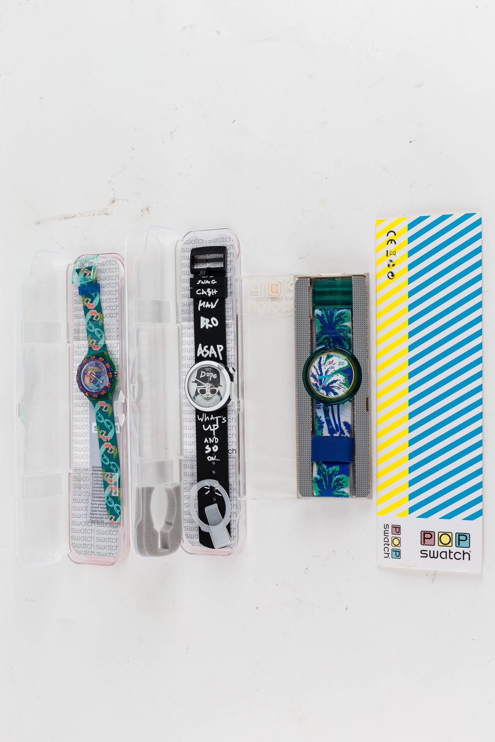 Swiss Watch Swatches (3) NIP: There are (2) Swatches and a Pop Swatch with cloth band. All are in original packaging.