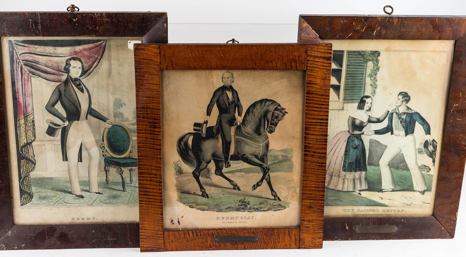 "Henry Clay" & Other Currier & Ives Lithographs: This lot of hand-colored lithographs includes "Henry Clay" with tiger maple veneer frame, "The Sailor's Return", and "Henry". Exposed area of the largest "Henry" measures approx. 13.5" H x 9.5" W. (Al