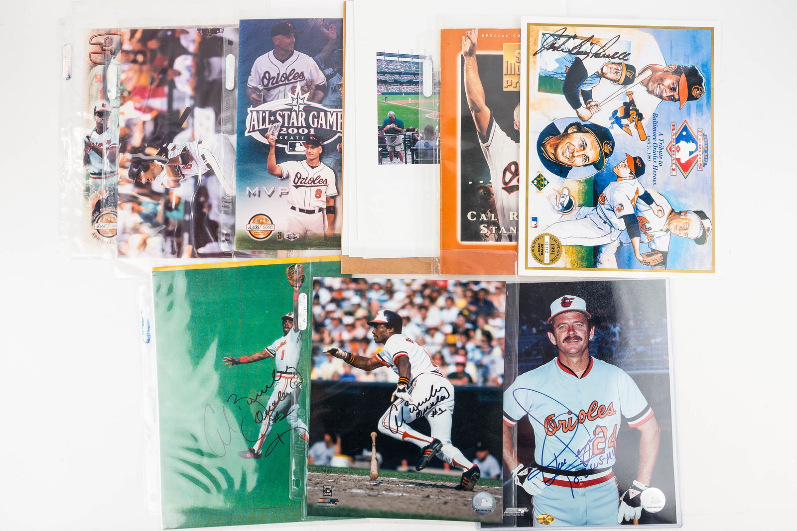 Certified & Other Autographed Photos: certified Rick Dempsey autographed photo, an Upper Deck Limited Edition 1991 print with Boog Powell autograph (uncertified), uncertified Al Bumbry (2), Sports Illustrated Cal Ripken 2131 Magazine, and