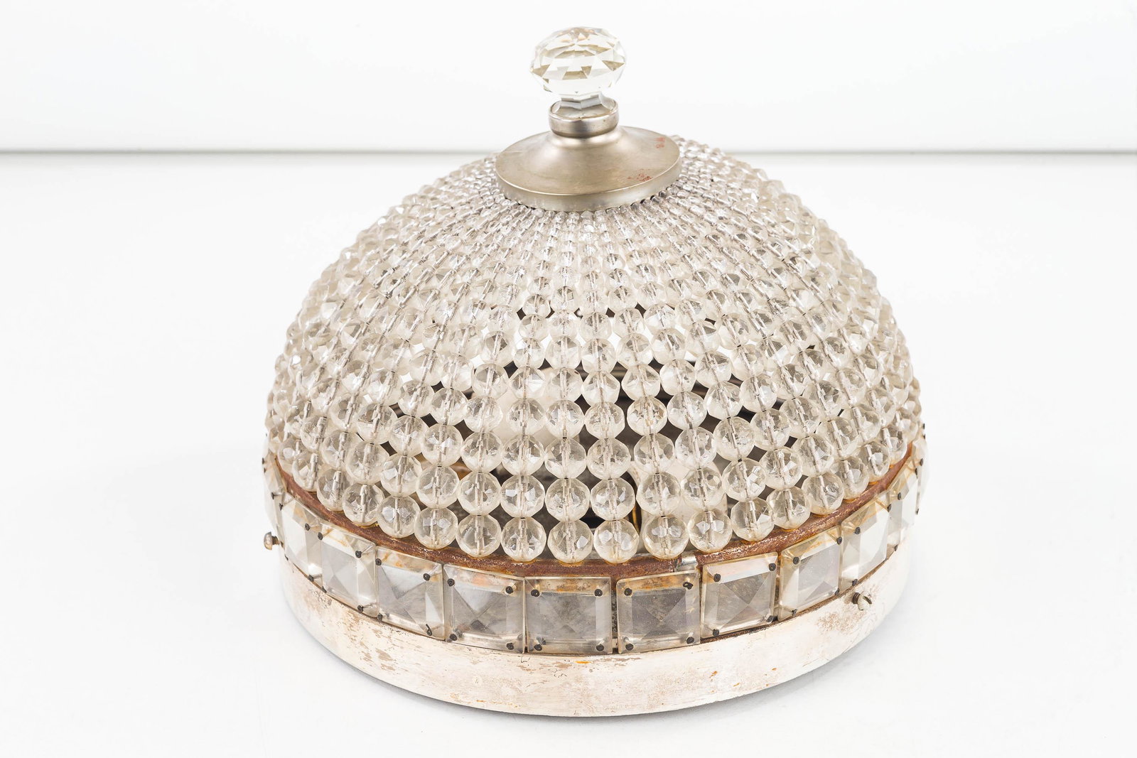 Crystal Ceiling Light Fixture: This vintage fixture with metal body is covered in crystals. It measures approx. 9" high and 10" in diameter