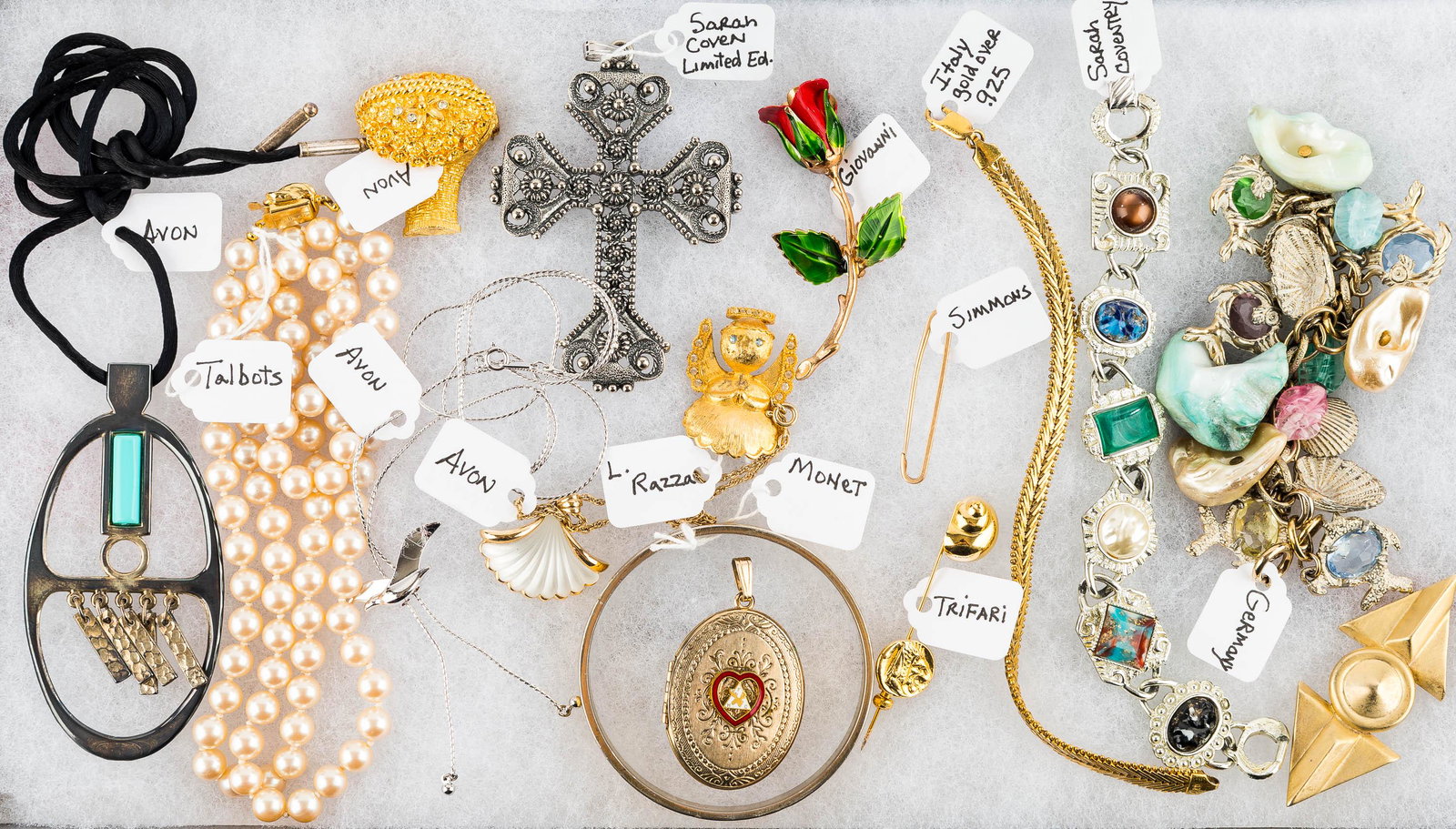 Designer Costume Jewelry: Highlights of this collection include an Italian gold-over-silver bracelet, a Talbot faux pearl necklace, a Monet cuff, Sarah Coventry items, and quality pieces from other makers.