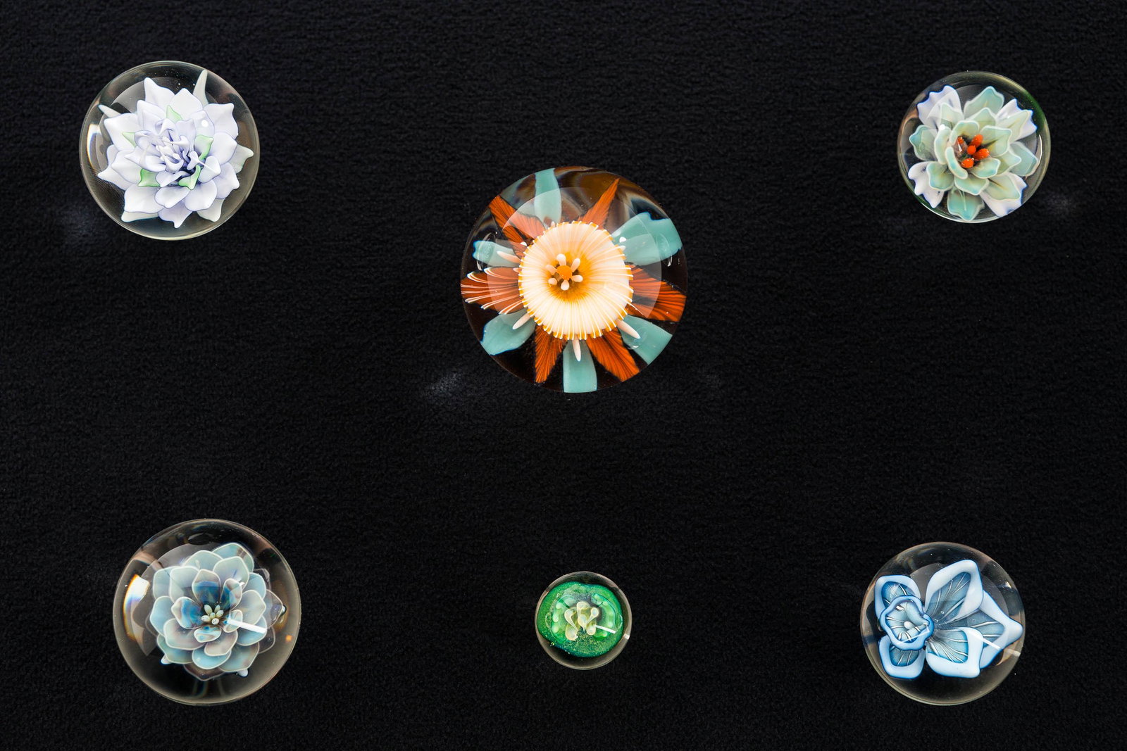 Zariel Shore & Other Lampwork Glass Marbles: There are (4) Zariel Shore marbles with floral art glass interiors signed "ZS" each dated 2012-2015; the largest of these measures approx. 29 mm diameter. There is also a large marble with floral inte