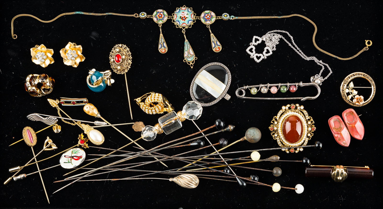 Hatpins & Other Costume Jewelry: There is a large selection of hatpins, many of them Victorian. There is also an Italian micromosaic necklace measuring approx. 15"L, an oval Monet pendant with onyx and mother-of-pearl inlay (with min