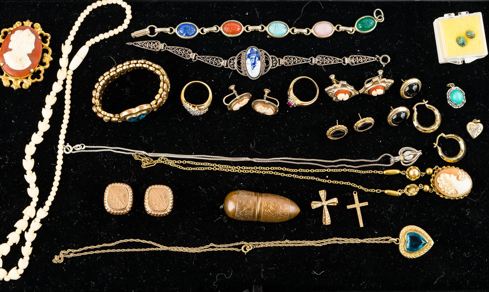 Sterling, Victorian, & Other Jewelry: There is a pair of sterling silver cameo earrings in oval frames, a sterling pendant with interior pearl on a chain measuring approx. 17"L, a cameo pendant on chain (possibly gold-fill) measuring appr