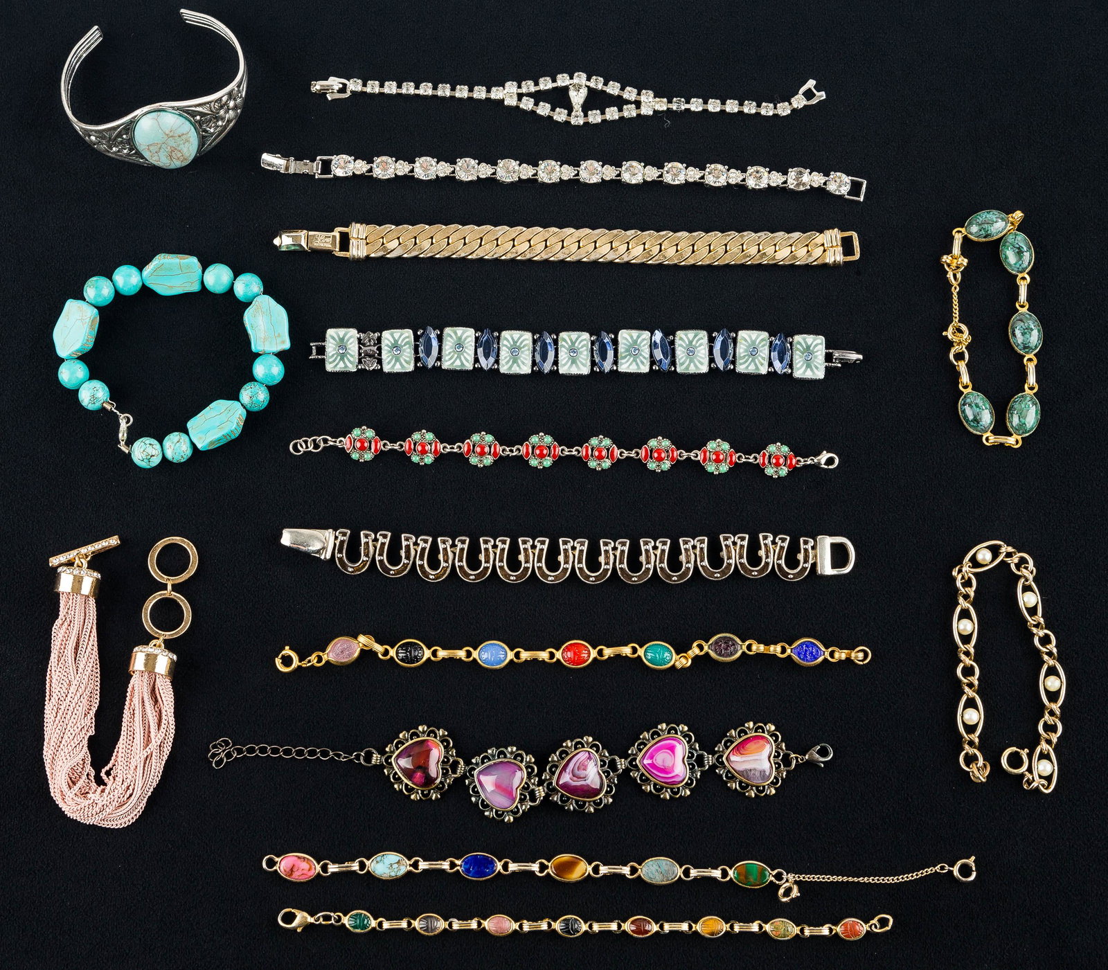 Mixed Bracelet Collection: This stylish collection include (3) scarab bracelets, clear rhinestone bracelet, heavy gold tone bracelet marked "Coro", a silver tone filigree cuff with faux turquoise stone, enameled and blue rhines