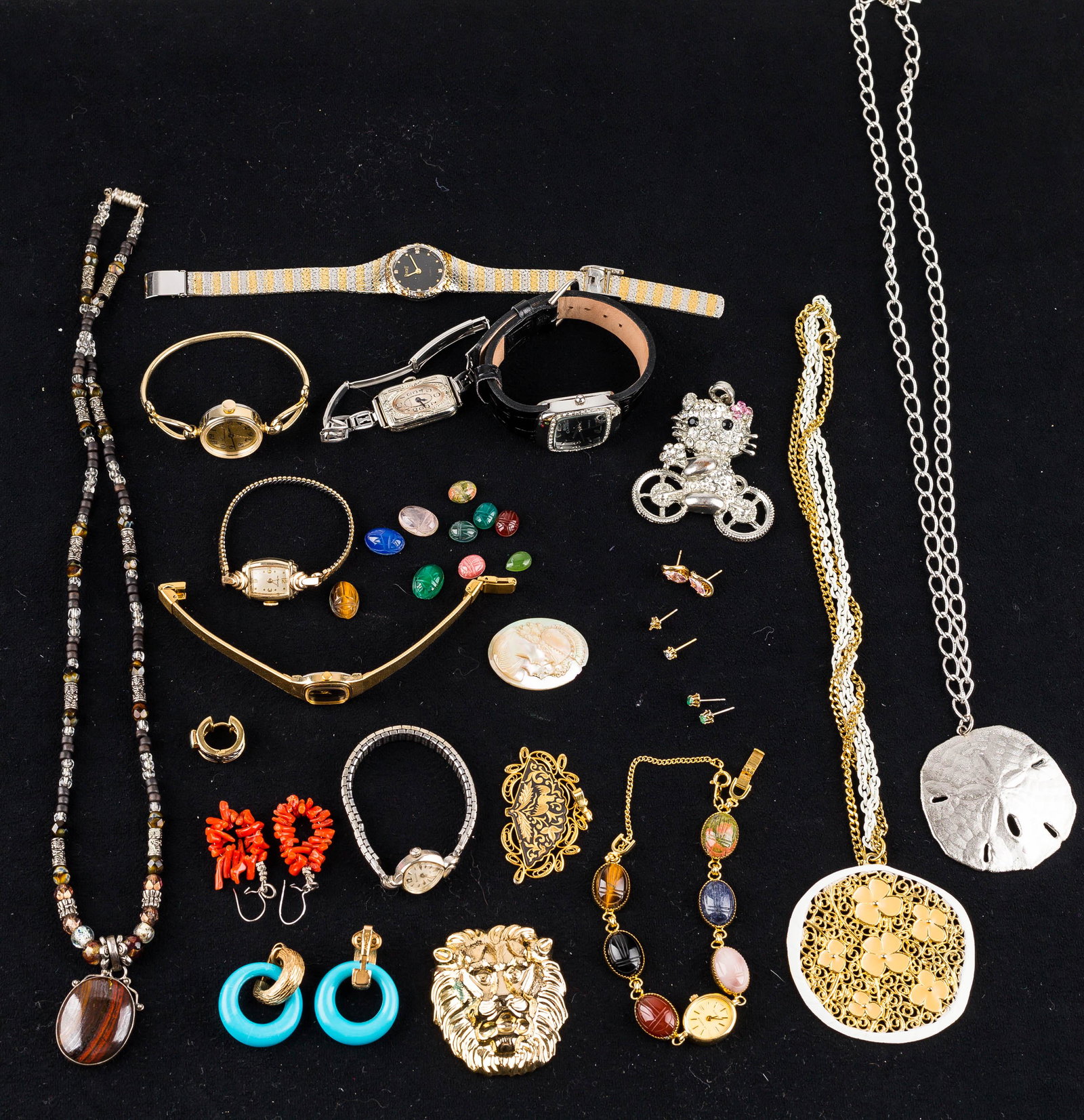 Vintage Jewelry and Watch Collection: Watches include a La Marquis ladies' watch with scarab band, loose scarabs, Bulova, Seiko and more. Lot also includes several necklaces, brooches, earrings, and more.