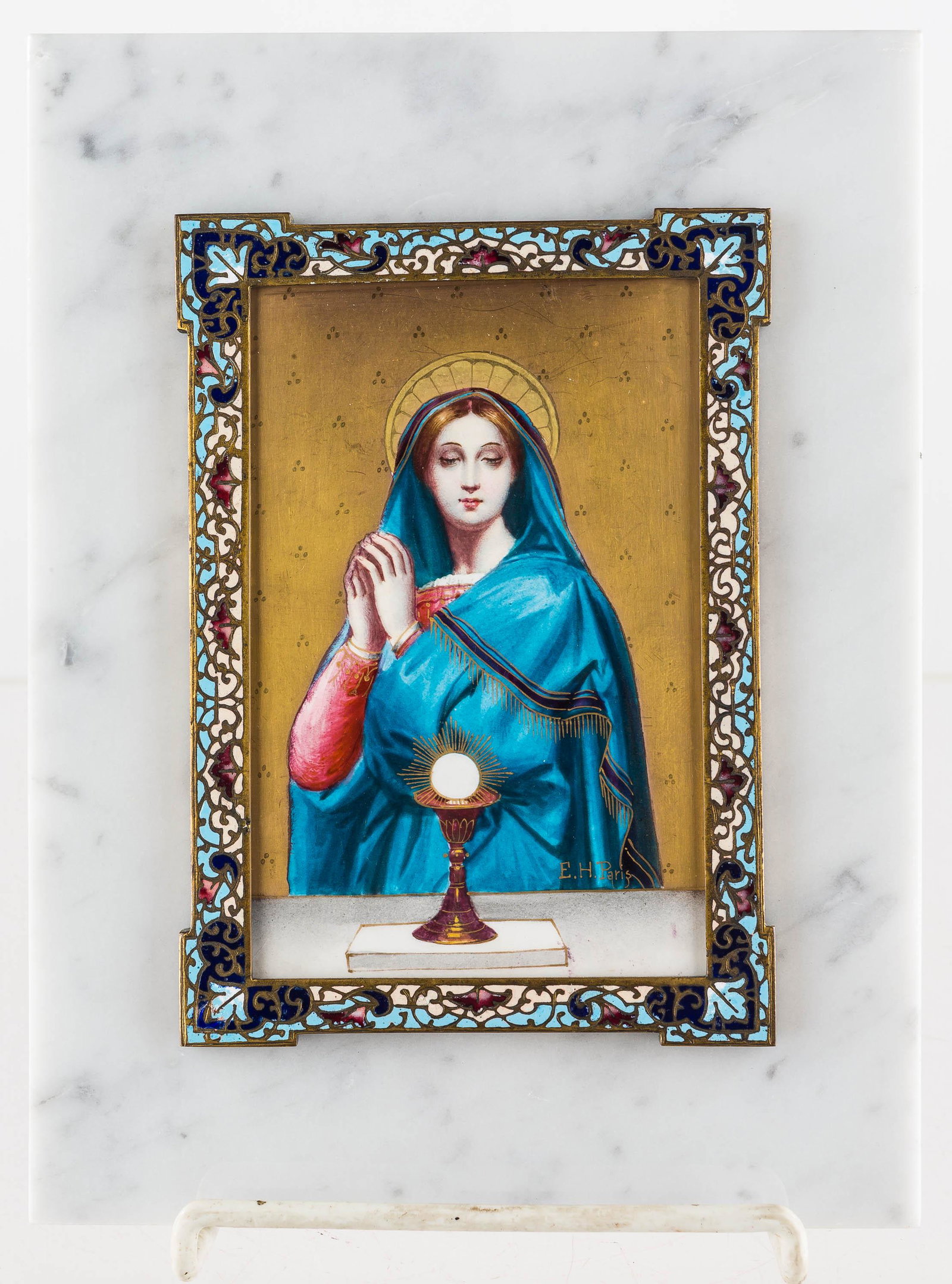 E.H. Paris Signed French Porcelain/Enamel Madonna: This hand-painted madonna with gold background is extremely well-executed and signed "EH Paris", lower, right. It is in an enameled champleve frame and mounted on a marble slab with brass backing. Pai