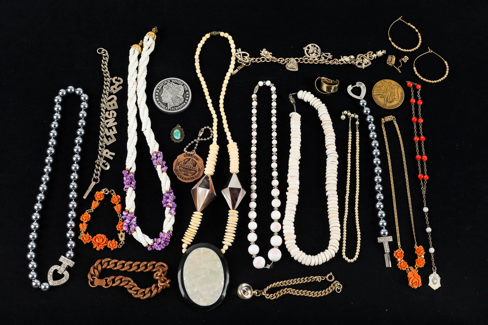 10k Gold Pin & Costume Jewelry (2 Trays): There is a small 10k gold Hempfield High School graduation pin with a 1959 tassel attached (tassel is not gold.) There is also a matching faux black pearl necklace and bracelet set, a charm bracelet, 