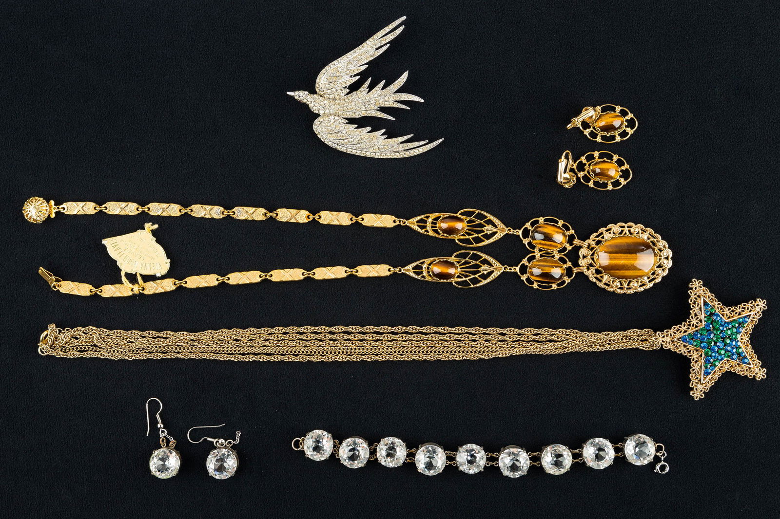 Vienna 24k Gold Plated Necklace & Quality Jewelry: This "Vienna Wood-Leaves Leavex" Austrian necklace and earring set is signed "24k gold plate" and has tiger eye style stones, original hang tag, measures approx. 21" L, and comes with a pair of matchi