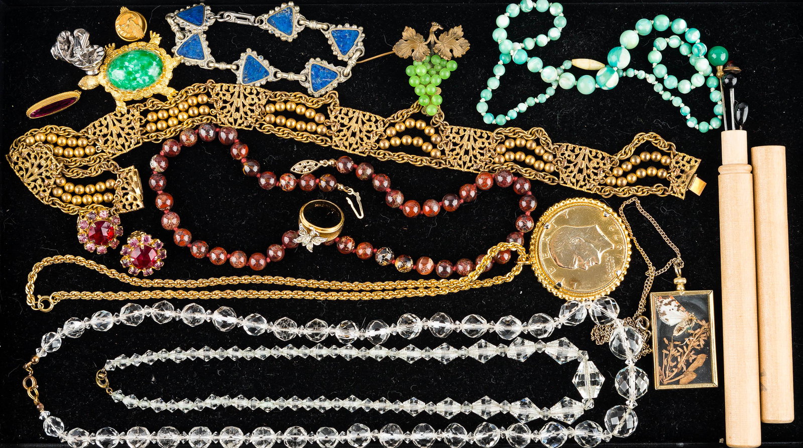 Vintage Estate Jewelry Collection: This vintage jewelry collection features a gold tone 1972 Eisenhower dollar necklace, a gold tone Victorian choker measuring approx. 14"L, deep red and aqua color beaded necklaces, a signed turtle pin