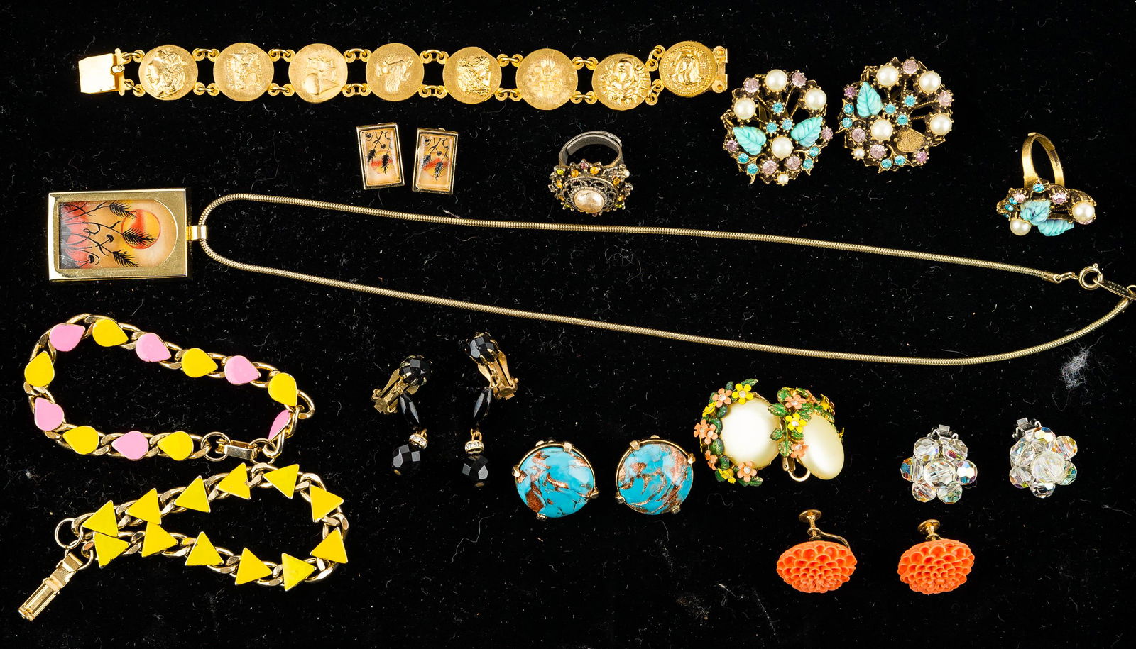 Vintage Jewelry Collection: This collection has a Whiting and Davis necklace with matching earrings, a Roman-style bracelet, several pairs of clip earrings, a ring, bracelets, and more.