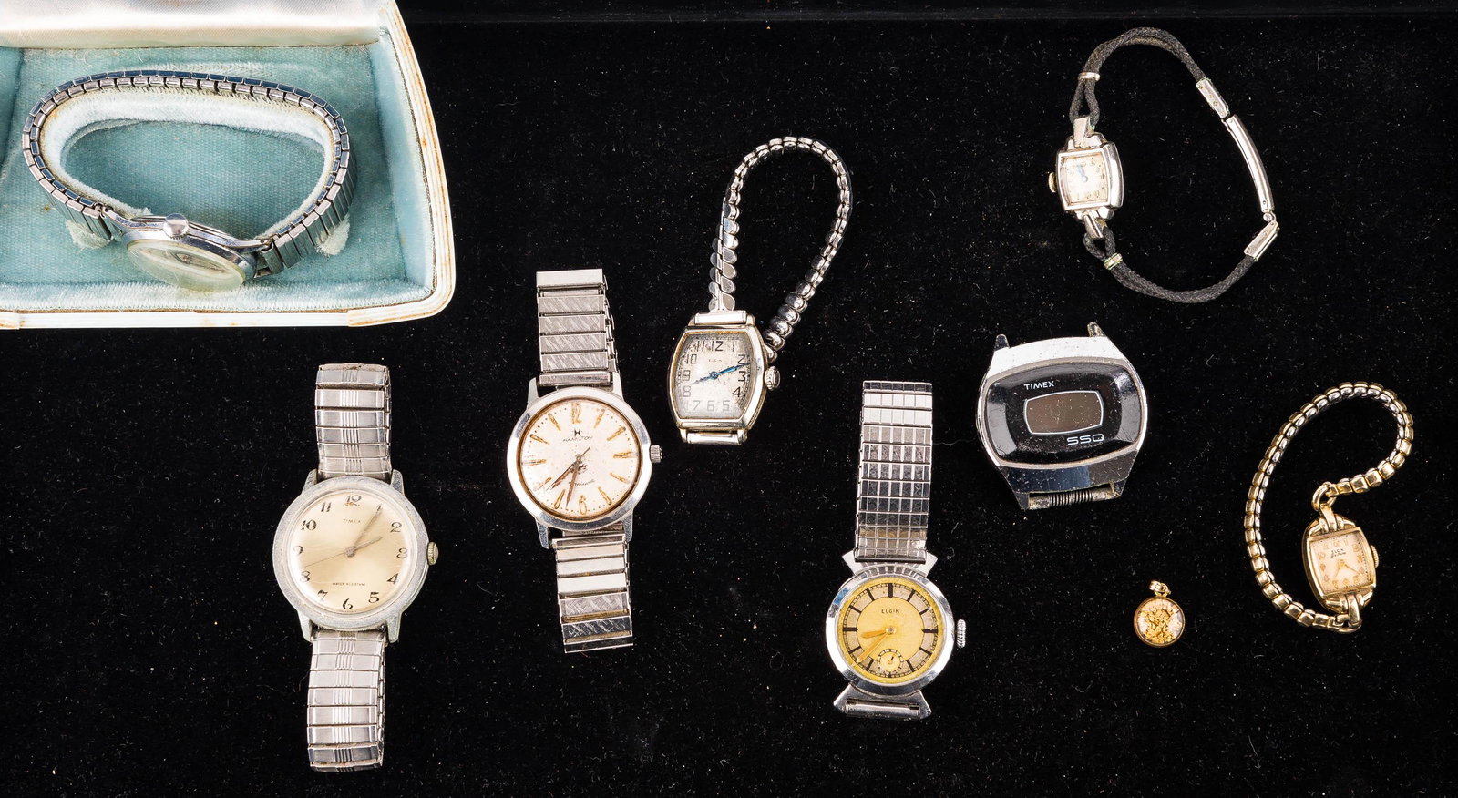 Vintage Watch Collection: This collection features a Wadsworth Durapower stainless steel watch marked "Swiss" in original box, a Hamilton stainless steel watch engraved with "Vincent Tassia" on the back and marked "Lifetime Ma