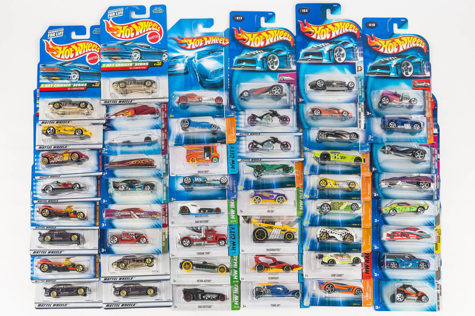(50) Hot Wheels NIP on Hang Card: There are (50) Hot Wheels, all new on hang card, with packs including 2008 All Stars, 2007 Track Stars, and 2013 vehicles.