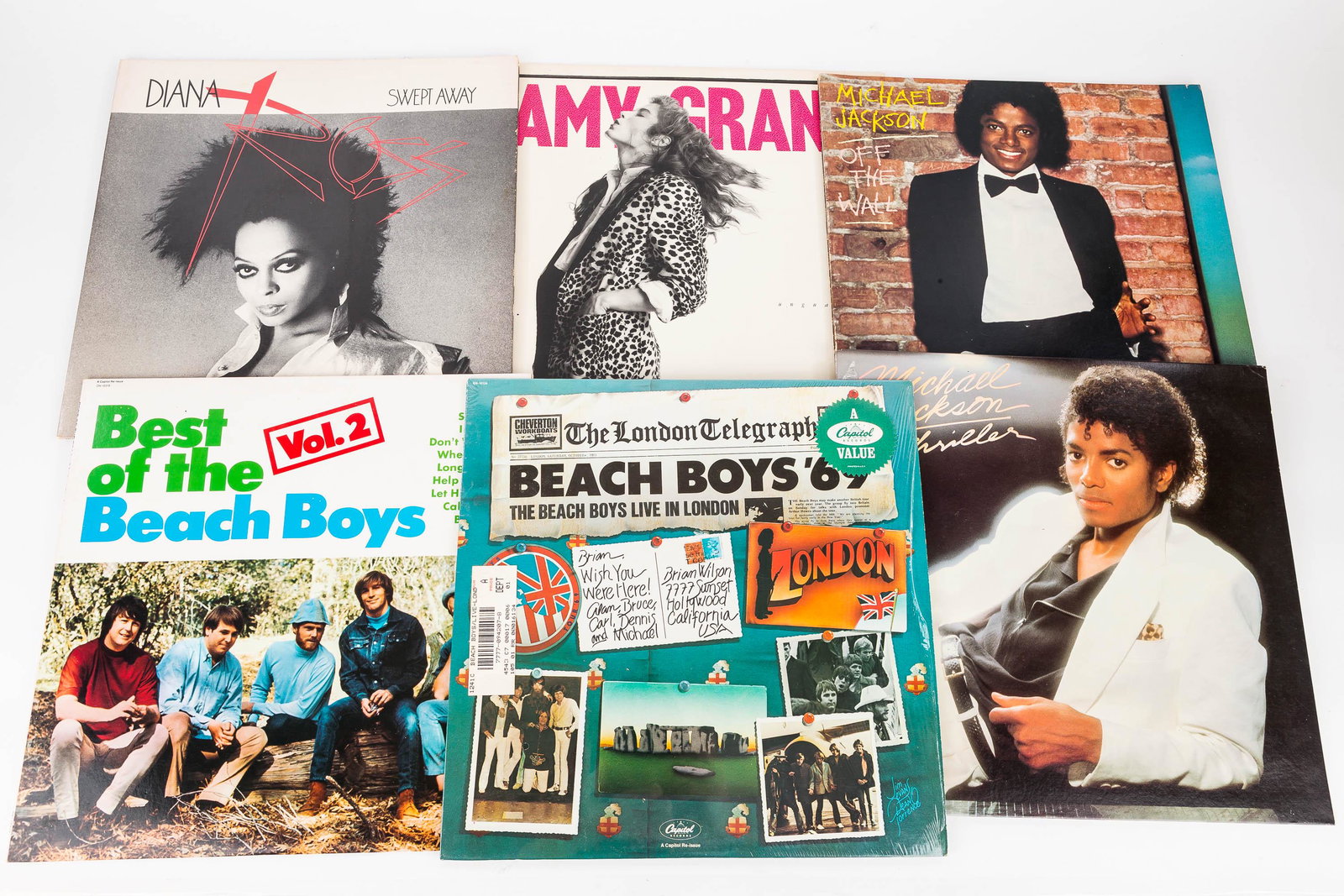 Michael Jackson & Other 33rpm Records: Michael Jackson records include "Thriller" dated (1982) and "Off the Wall" dated (1979). There is also Diana Ross "Swept Away" dated (1984), Amy Grant "Unguarded" (1985), "Best of the Beach Boys Vol. 