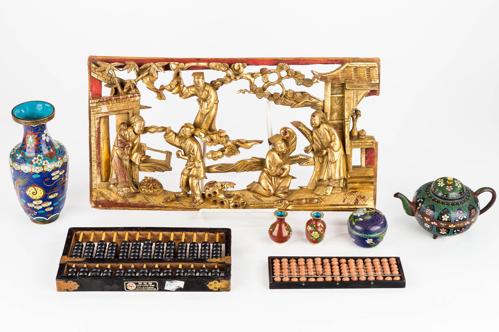 Antique Asian Decorative Items: 19th C giltwood panel of Asian elders and family life signed on back in symbols; Lotus Brand abacus made in China and another unmarked abacus; and cloisonne 7.5" vase with dragons (5 toes), small teap