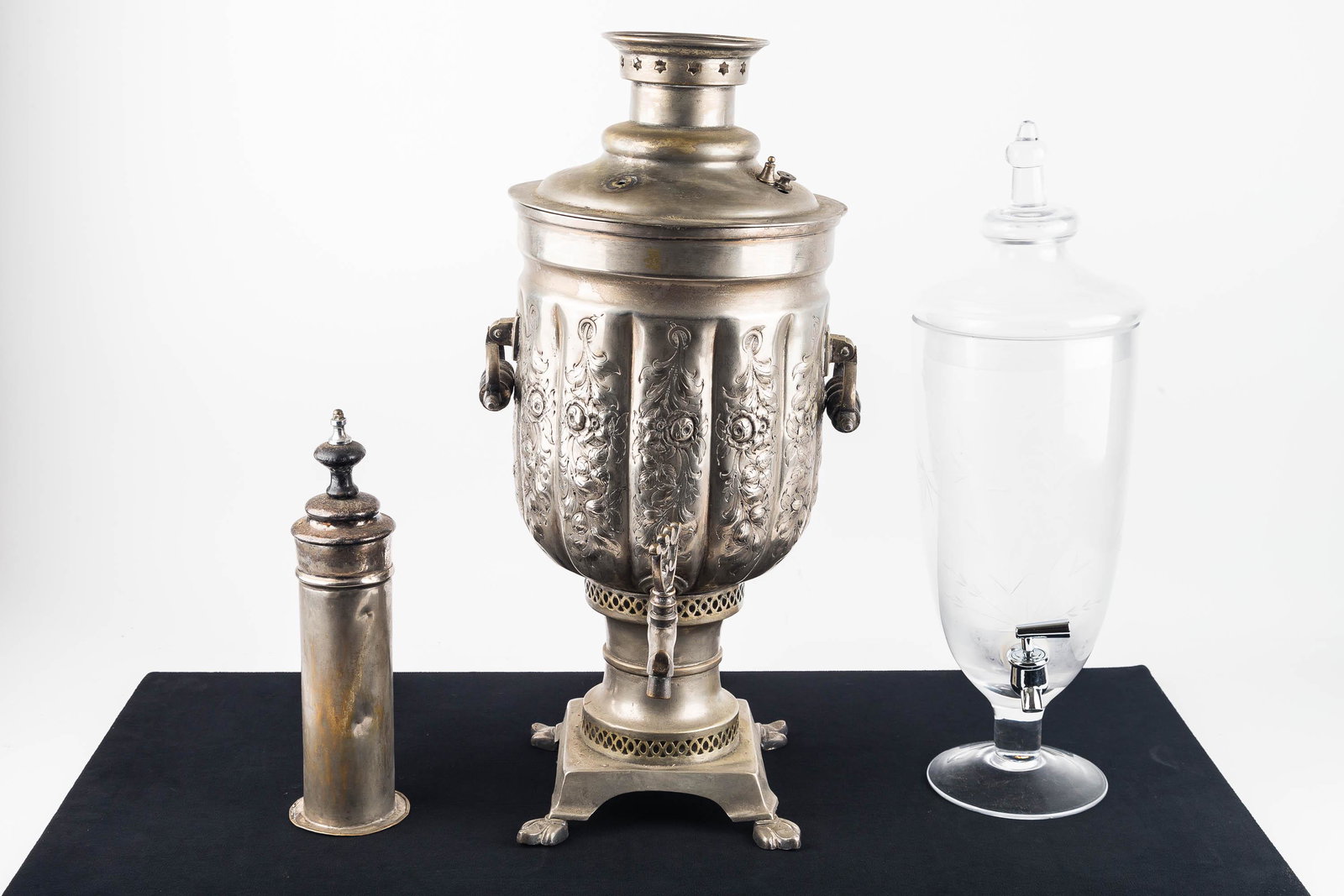 Richard Wright Manchester Coffee Pot and Dispenser: The samovar style coffee pot marked on bottom Richard Wright Manchester (England) is approx 32" H and missing two mounts. The 20th C etched glass beverage dispenser is approx 19.5" H.