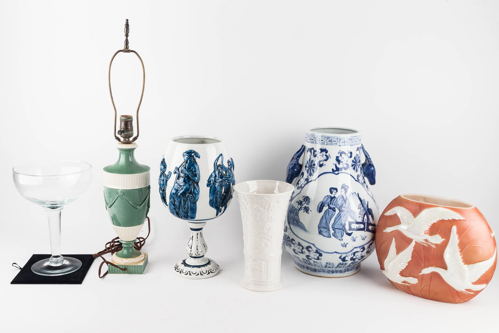 Wedgwood and Other Large Display Items: Wedgwood fine white earthenware vase in the classic garden pattern is approx 9.75" H, green and white 25" H porcelain lamp is loose at base; oversized martini glass / compote is approx 10.5" H, blue a