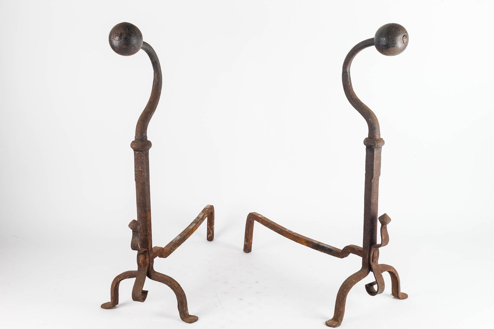 Arts and Crafts Era Andirons (Pair) Late 19th C: Massive peened ball finials, spit hook at base, and penny type feet. They display nicely and stand approx 28.5" H with 21" depth and 10.5" W. Special shipping considerations due to size and weight.