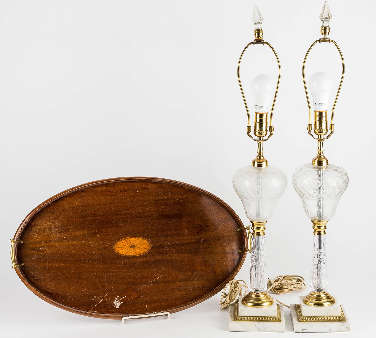 Pair of Lamps and Serving Tray: Pair of matched cut glass, brass and marble lamp, along with a Edwardian Style wood with inlay serving tray (some surface scratches and crazing).