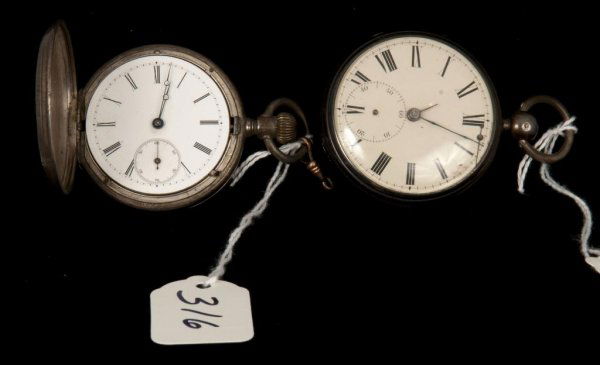 Pocket Watches: Two piece lot of early pocket watches; one is a Longines key wind, silver; the other is a coin silver key wind; both as is