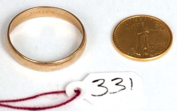 Coin - Gold Eagle: $5. gold eagle 1/10 of one oz. .9167 fine gold. with a wedding band