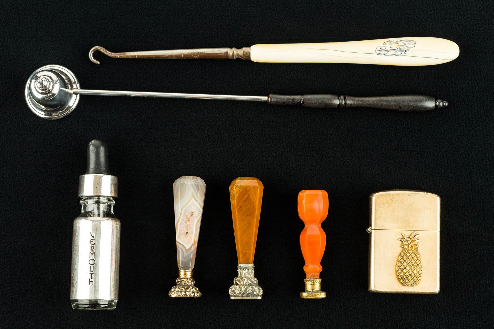 Sterling Silver Bottle and Zippo: A Fisher sterling silver Vermouth bottle with a dropper top (approx 3.5" T), a Zippo 10K gold filled lighter, 3 wax seals with stone handles (one with amethyst head), a candle snuffer and a shoe butto