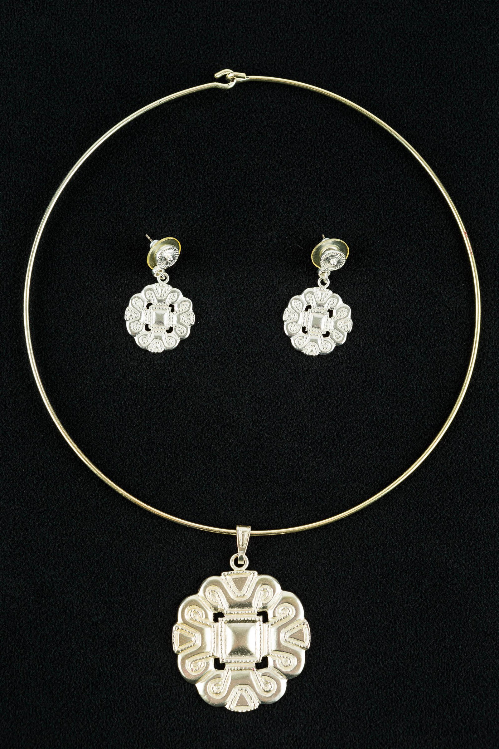 South African Silver Necklace & Earrings: Set includes a high quality silver choker with geometric pendant measuring approx. 1.5"dia. It has matching post earrings, and all items are hallmarked. Silver content unknown, but presumed to be high