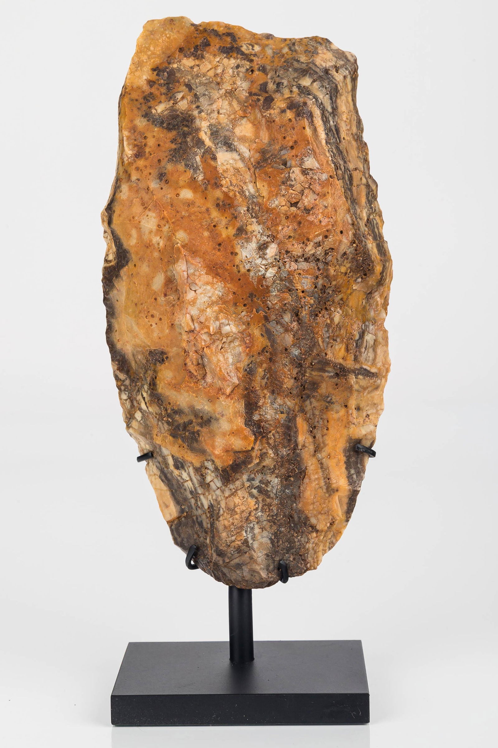 Paleolithic, Acheulean Cleaver: This large Paleolithic cleaver has one end that is flat (not pointed like the axe) made from multicolored jasper is Acheulean from Mauritania, Atlanthropus Mauritanicus and est 700k - 120k years old.