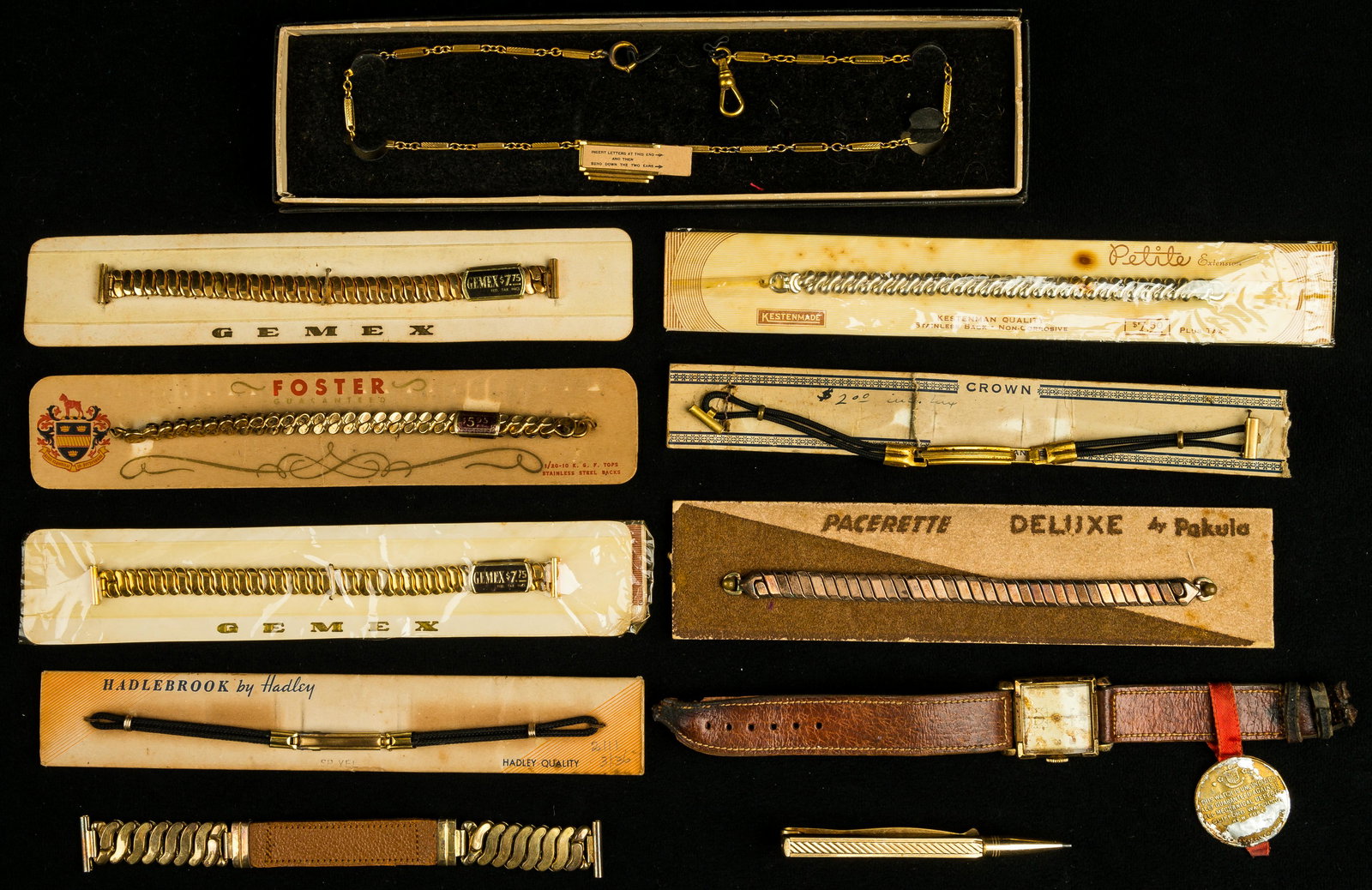Clifford Watch & New Old Stock Watch Bracelets: Five new old stock watch bracelets, watch chain, 'Clifford' base metal watch in As Found condition (wind up needs cleaned, strap replaced) and 'Swank' U.S. Pat #24227 working pencil tie bar.