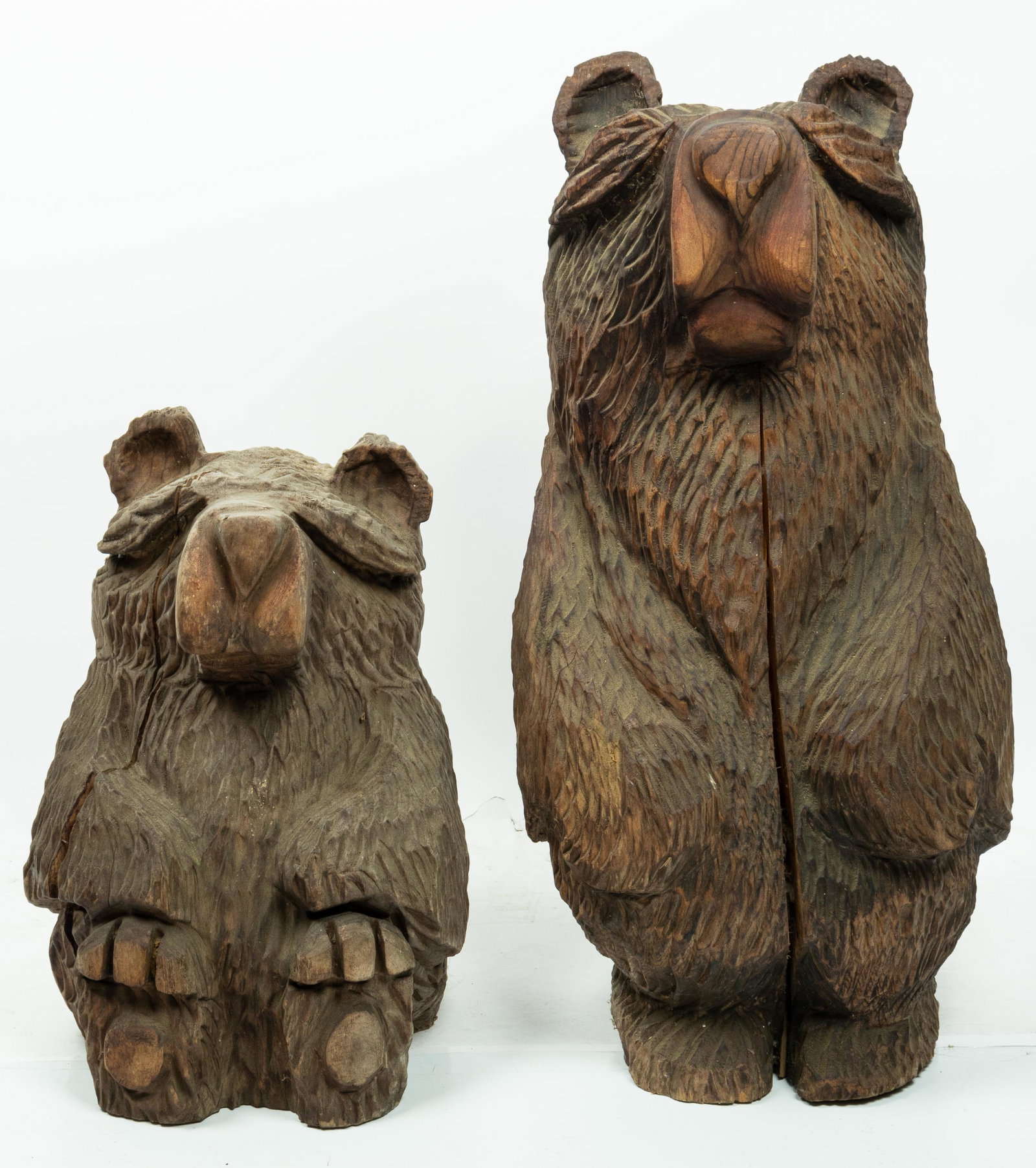 Two Large Log Bear Carvings: Two large scale log bear carvings. Artisan carved, log bear carvings ere purchased in Colorado. Tallest measures 29.5"h, smallest measures approx. 19"h. Special pick up/shipping considerations must be