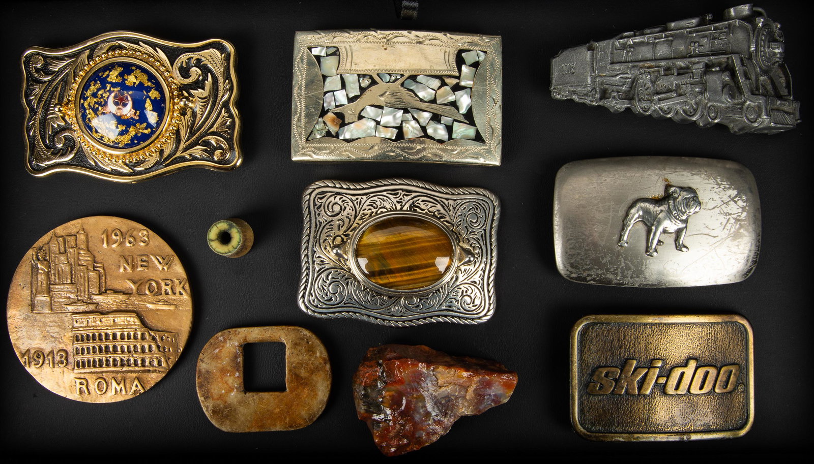 Belt Buckles & More (10 pieces): Lot of 10 items featuring a Mexico buckle with inlaid mother of pearl, a USA buckle with large tiger's eye stone, train buckle, an early bone drawer pull (?), and more.