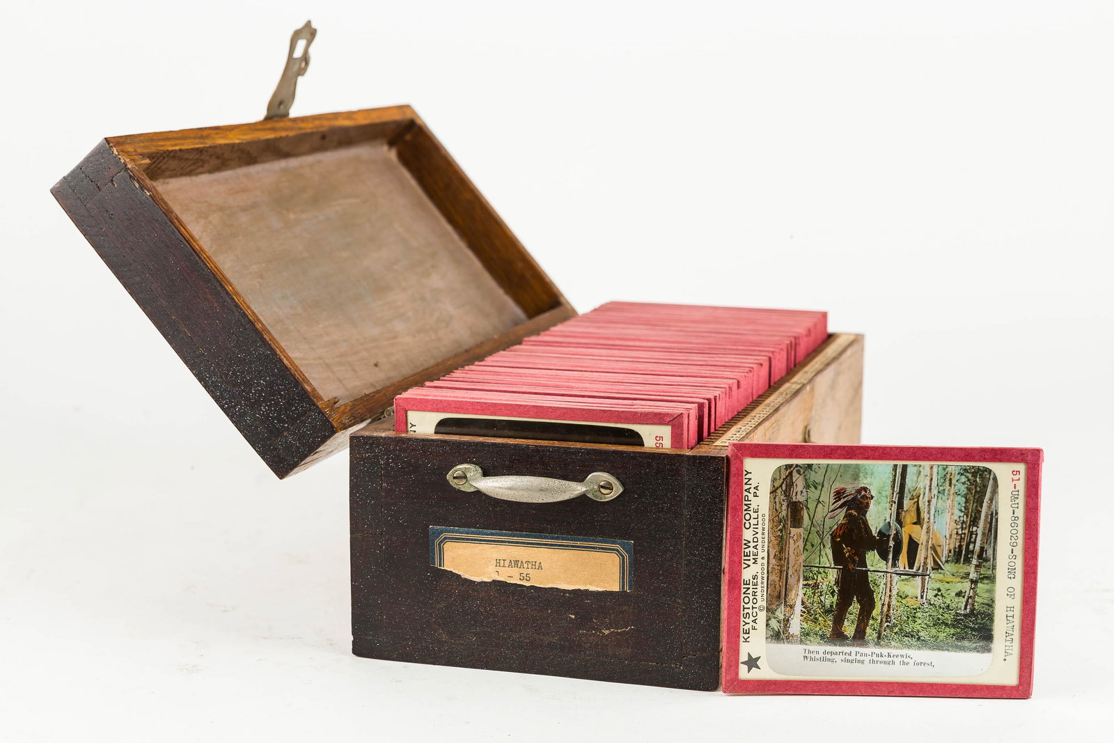 55 Lantern Slides on Hiawatha in Wood Case: Slides are a series of 55 on Hiawatha for the Educational Lantern Slides by Keystone View Company, Inc. Meadville, PA. It covers Indian dress, the entire Song of Hiawatha over many slides, and more.