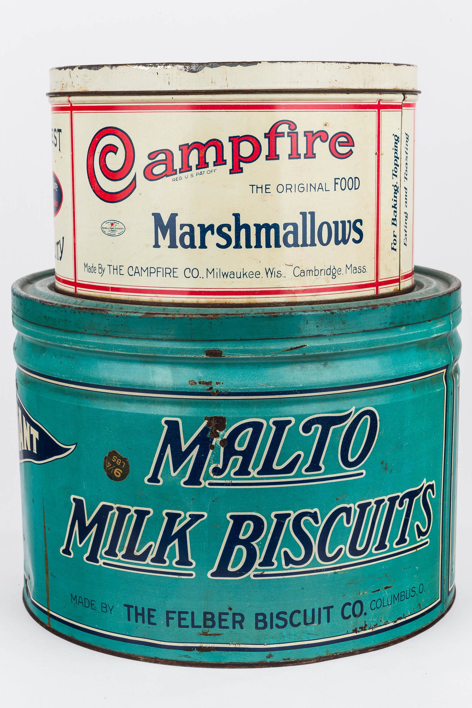 Country Store Advertising Tins (2): There are two country store advertising tins including Malto milk biscuits and Campfire marshmallows measuring approx 9"H x 12" in diameter.
