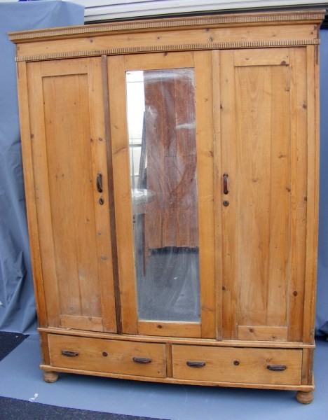 Pine Armoire: Pine country armoire with carved bonnet two doors over two drawers, 77"h, 61-3/8"w 23-1/4"d