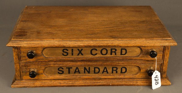 Spool Cabinet: Oak 19th C Two drawer spool cabinet with Victorian pulls, 23"x7-1/2"x14-1/2"