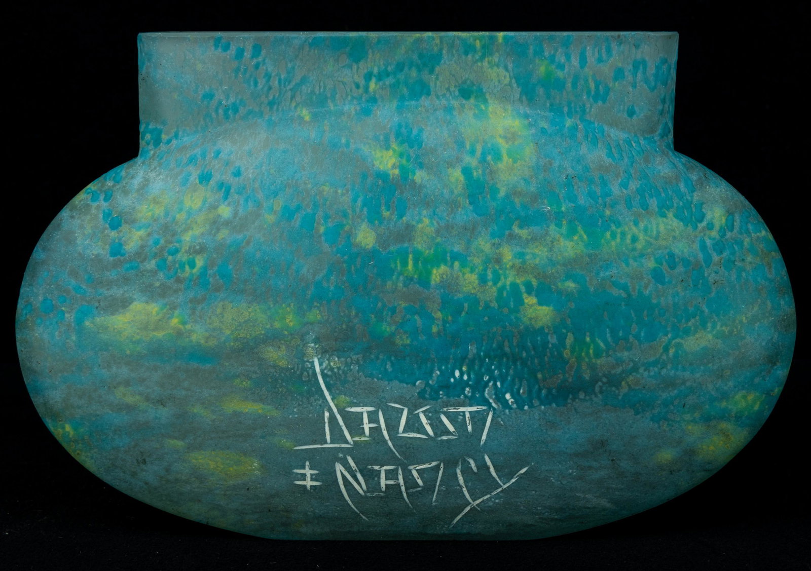 Daum Pate De Verre Ovoid Vase: This ovoid vase in blue and yellow vase with 'Daum Nancy with Cross of Lorraine' signature etched in front stands approx 4.5"H. Seems to have slight rubbings that left discoloration, as seen in photos