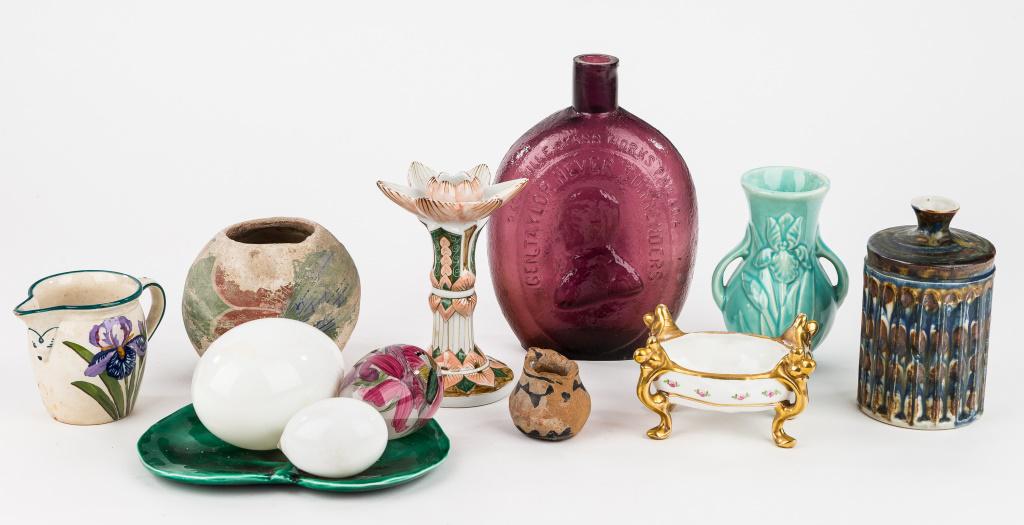 Glass, Porcelain and Pottery: Including Oyottville Glass Works Philadelphia purple glass bottle, H.H. Rand Limoges dish, Duggers lily pad dish, Inora Thialand porcelain candlestick unmarked pottery, reverse painted egg with hummin