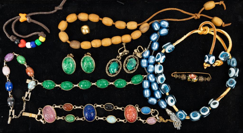 Glass, Wood & Lucite Jewelry: Featuring glass scarab jewelry, blue lucite with a tassel, wood beads and string of Nazar 'evil eye' glass beads.