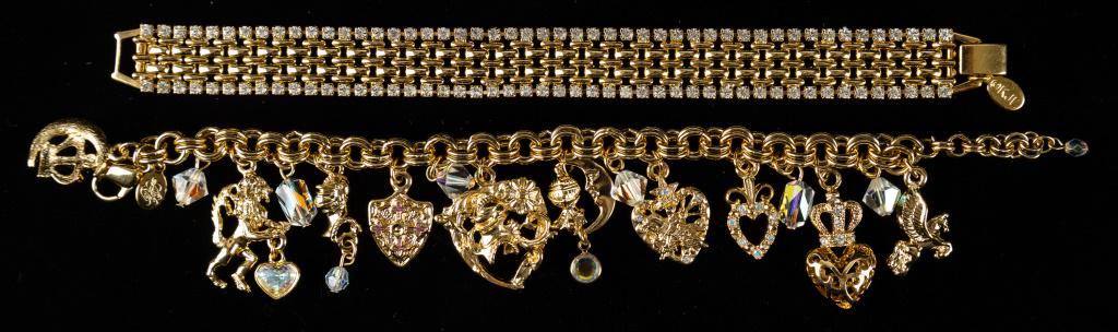"KJL" and "Kirks Folly" Bracelets: Signed "Kirks Folly" charm bracelet with crowns, lions, hearts with crystals and signed "KJL" gold tone bracelet with crystal detail.