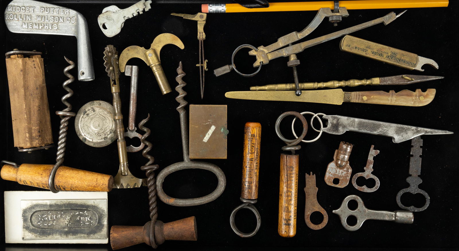 Bottle Openers, Corkscrews, and More: Including H. Padams, James Clark Distilling Co, C. D. Kenny Co. corkscrews, Independent Towel Supply Co. Tie Fast, a cigarette roller, various keys and more.