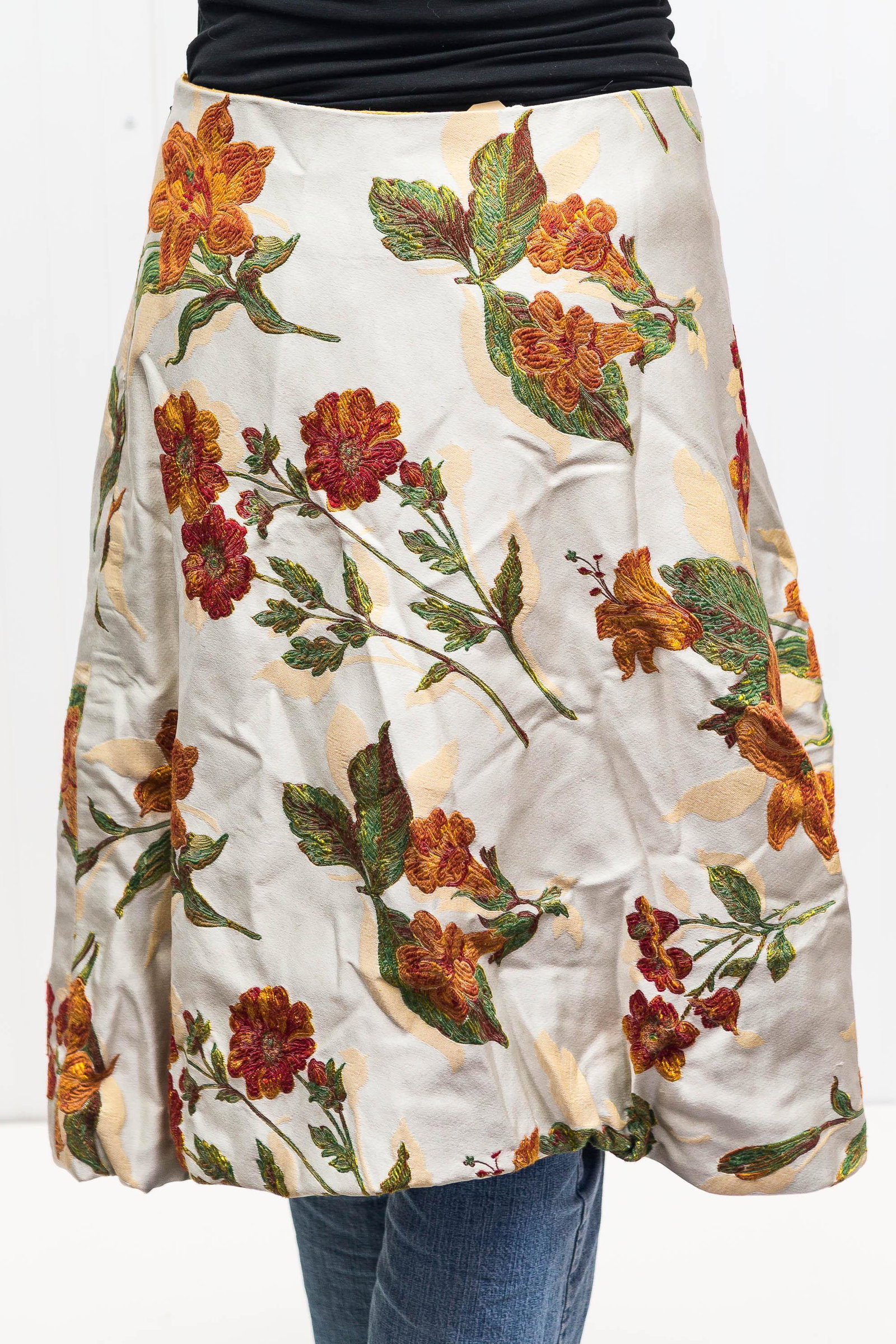 Holly Krueger Vintage Evening Skirt: This fine silk taffeta balloon and pleated skirt is hand-embroidered with a bright orange lily and floral design. It is lined with orange silk and has a side zipper.