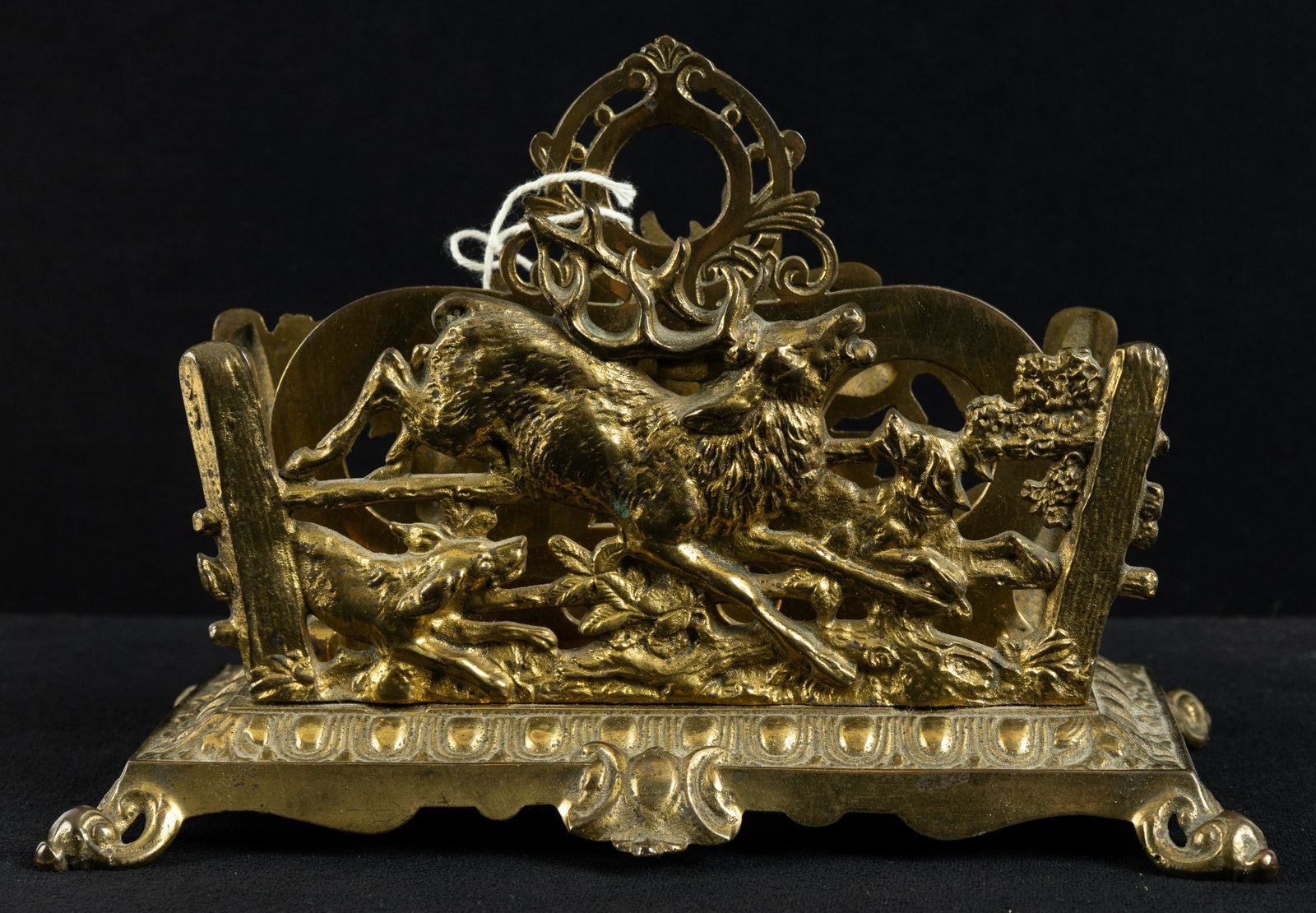 Bradley & Hubbard Brass Letter Holder: Bradley & Hubbard brass letter holder featuring stag pursued by hunting dogs on both sides, stamped on bottom, stands approx 6"H x 7.25"L x 5"D.