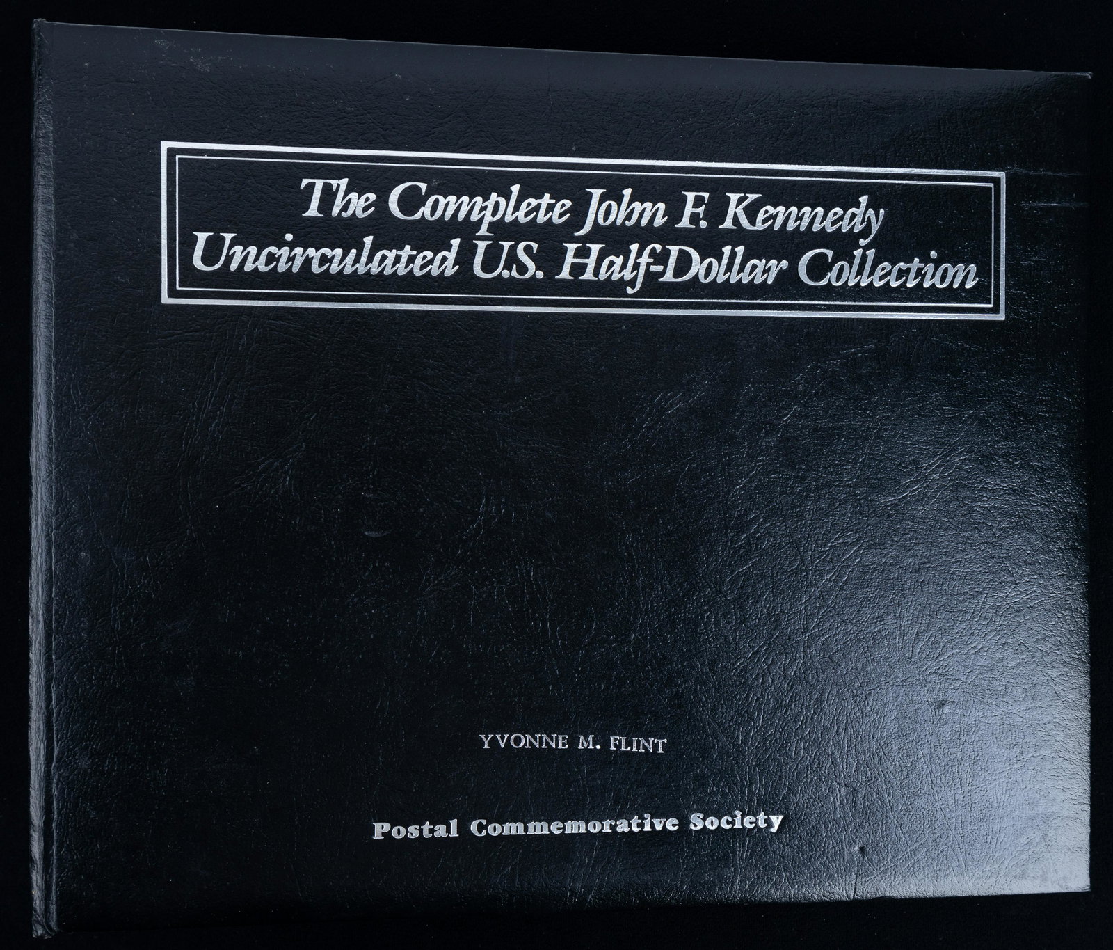 Uncirculated JFK Half Dollar/Stamp Book (1 of 4)