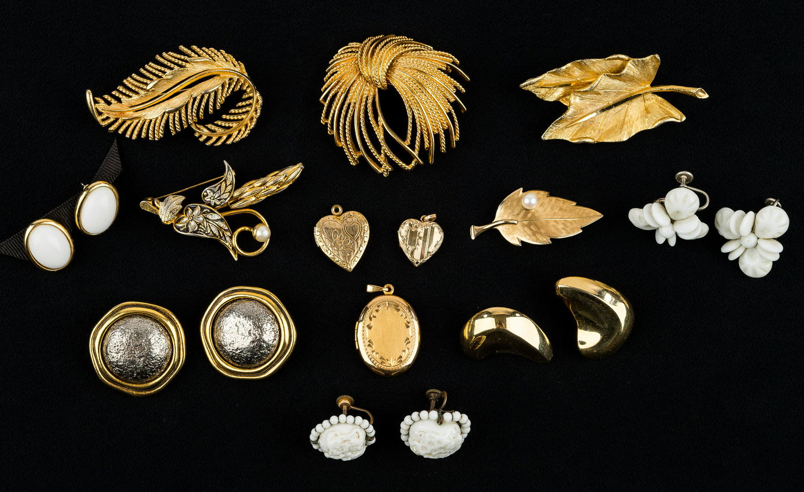 Vintage & Designer Costume Jewelry: Quality vintage and designer costume jewelry featuring a vintage Lisner feather pin, a vintage Krementz leaf pin with pearl, 2 pairs of vintage milk glass screwback earrings (1 marked 'Made in Western