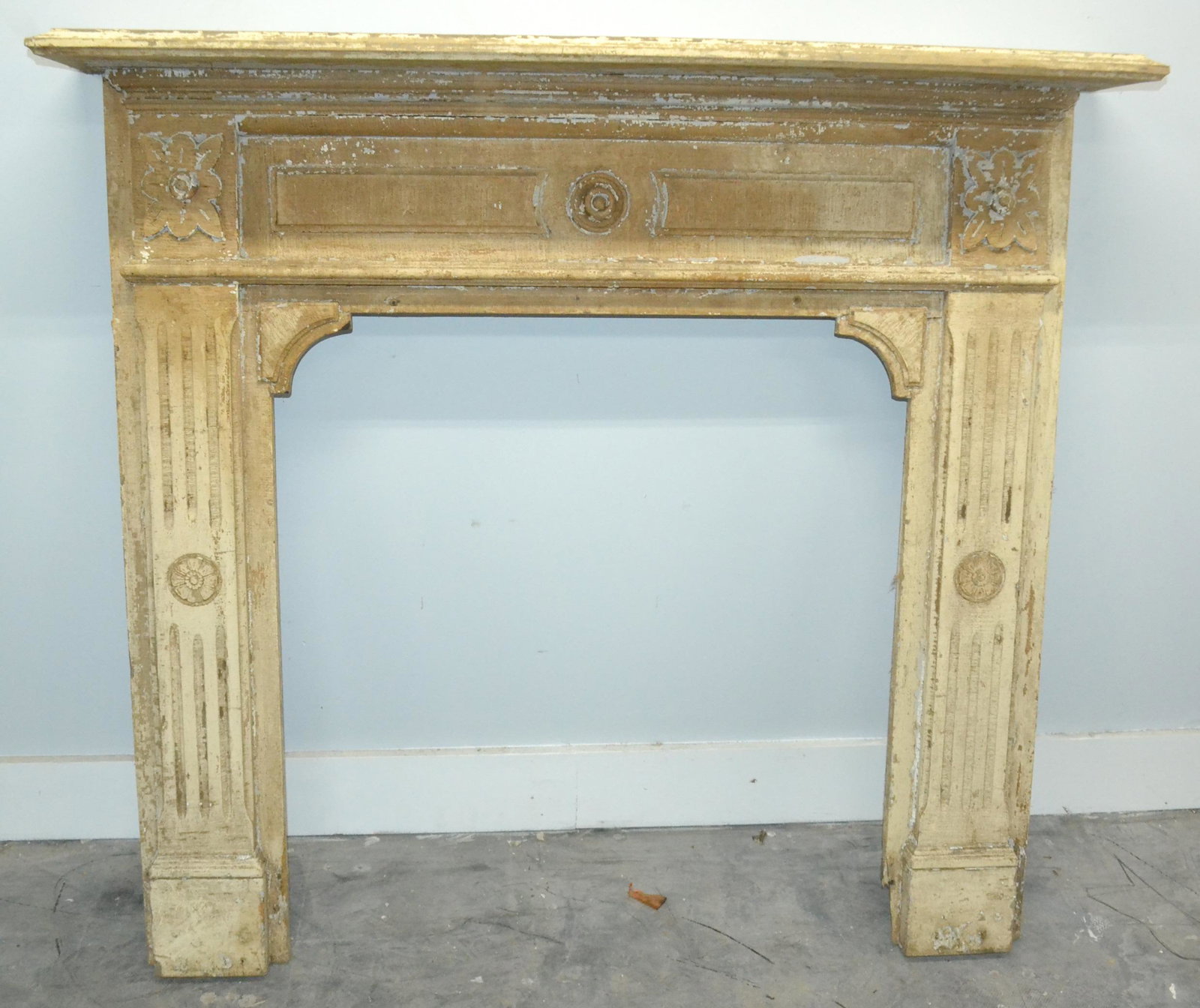 Victorian Mantle: This painted wood mantle is approx 49"H x 51"W x 9"D. It has paint loss, possibly an incomplete paint stripping job.