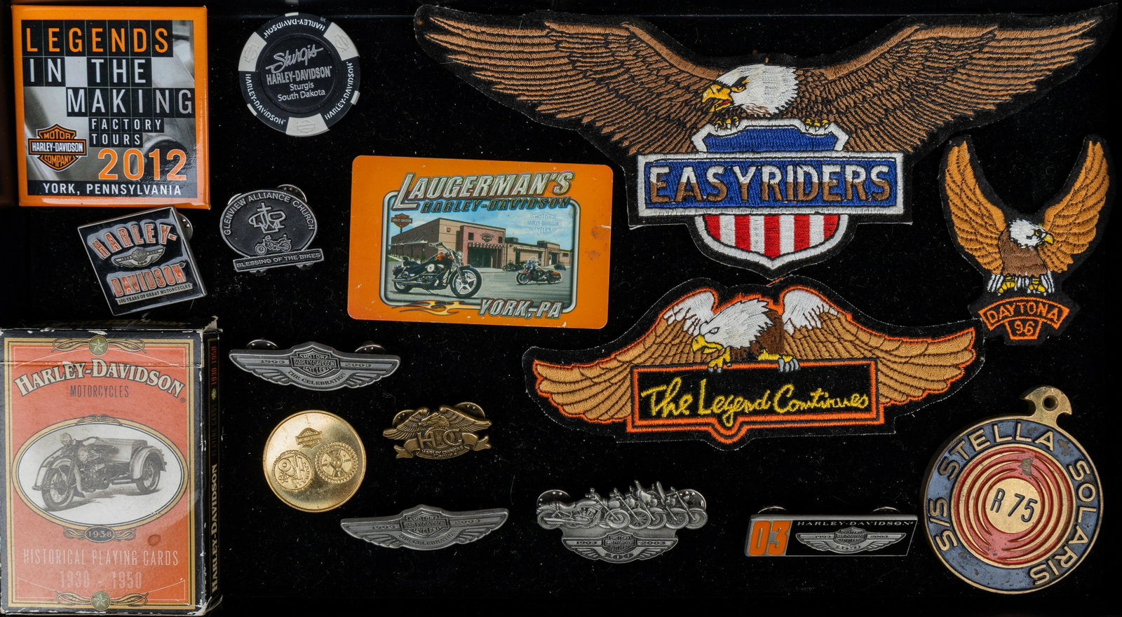 Harley Davidson Patches, Pins, Cards: 3 iron on Harley Davidson eagle patches, largest approx 9"W, (4) 2003 pins, 2003 token, Sturgis poker chip, 1930-1950 Historical card deck from 1997 (complete), 2012 factory pin, blessing of bikes pin