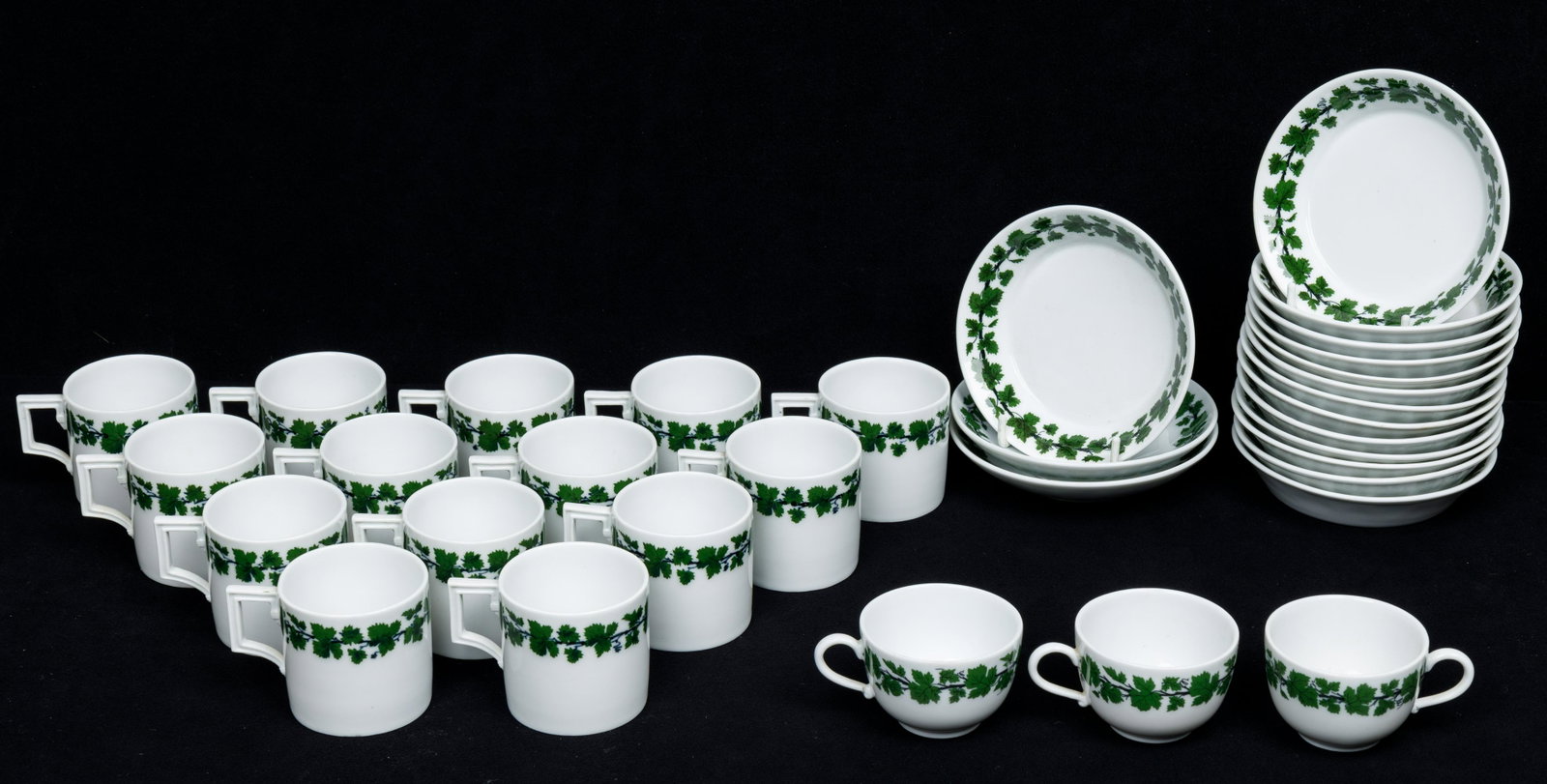 Meissen Grape Leaf Espresso & Demitasse: Meissen marked grape leaf and vine patterned espresso and demitasse cups include, 14 espresso cup, 14 espresso saucers, 3 demitasse cups and 2 demitasse saucers (1 with rim chip).