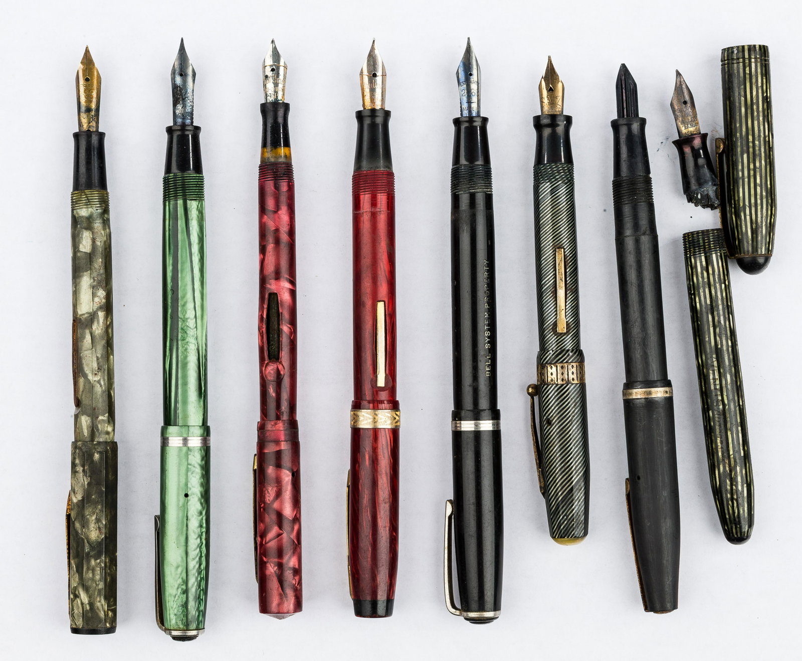 Antique Fountain Pens: 8 Antique fountain pens including brands Stratford, Esterbrook, Waltham, Salz, and Venus Autograph (with damage as seen in photo).